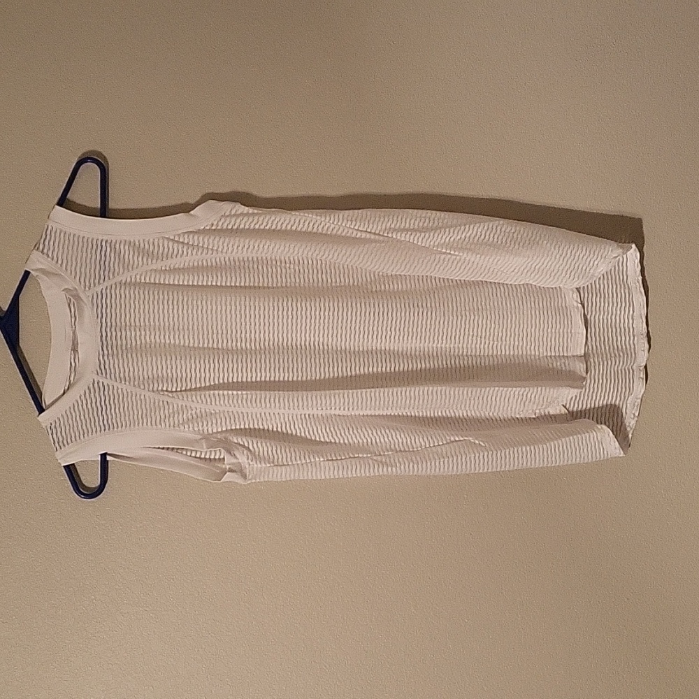See-through white tank.